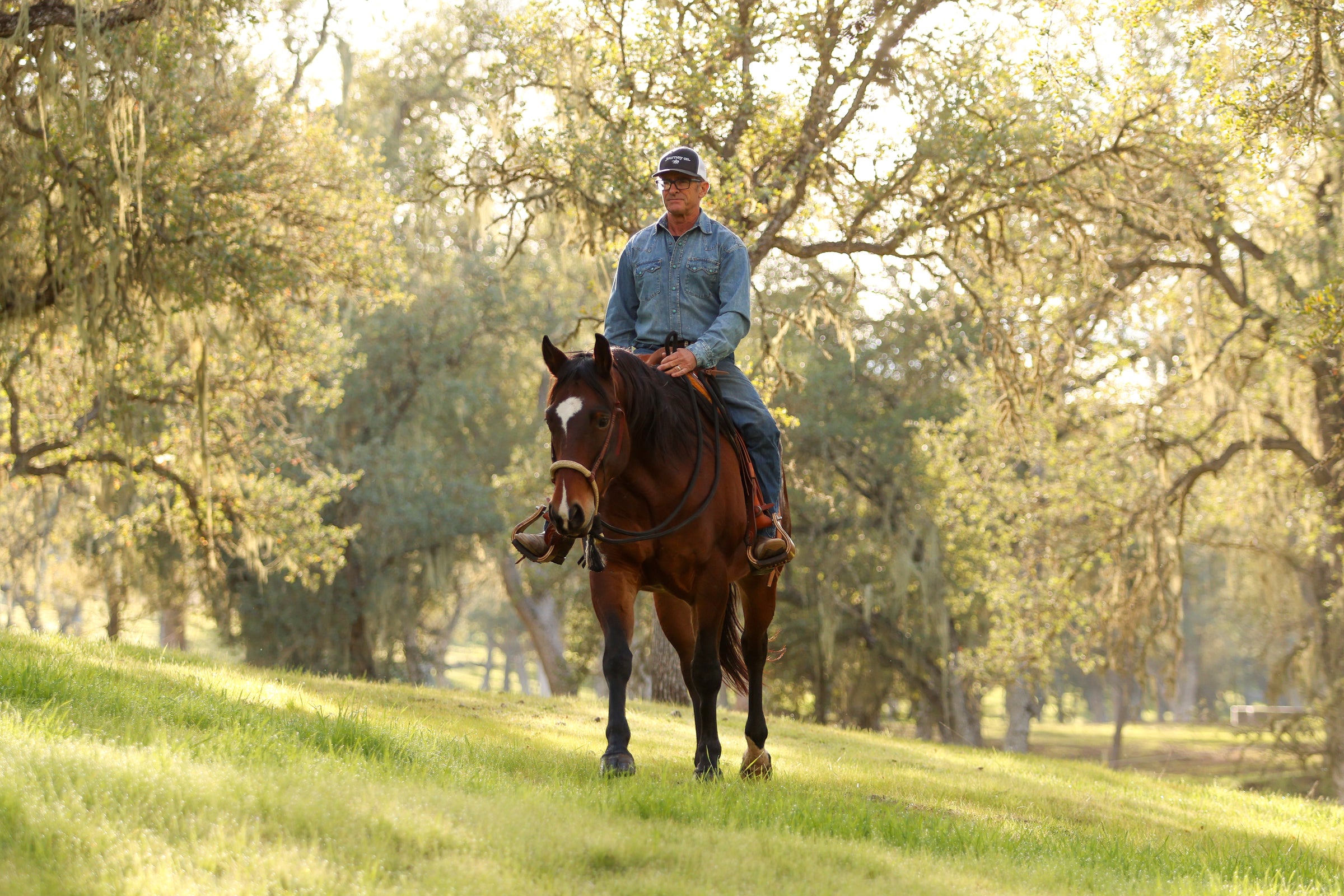 Warwick Schiller riding on the trail